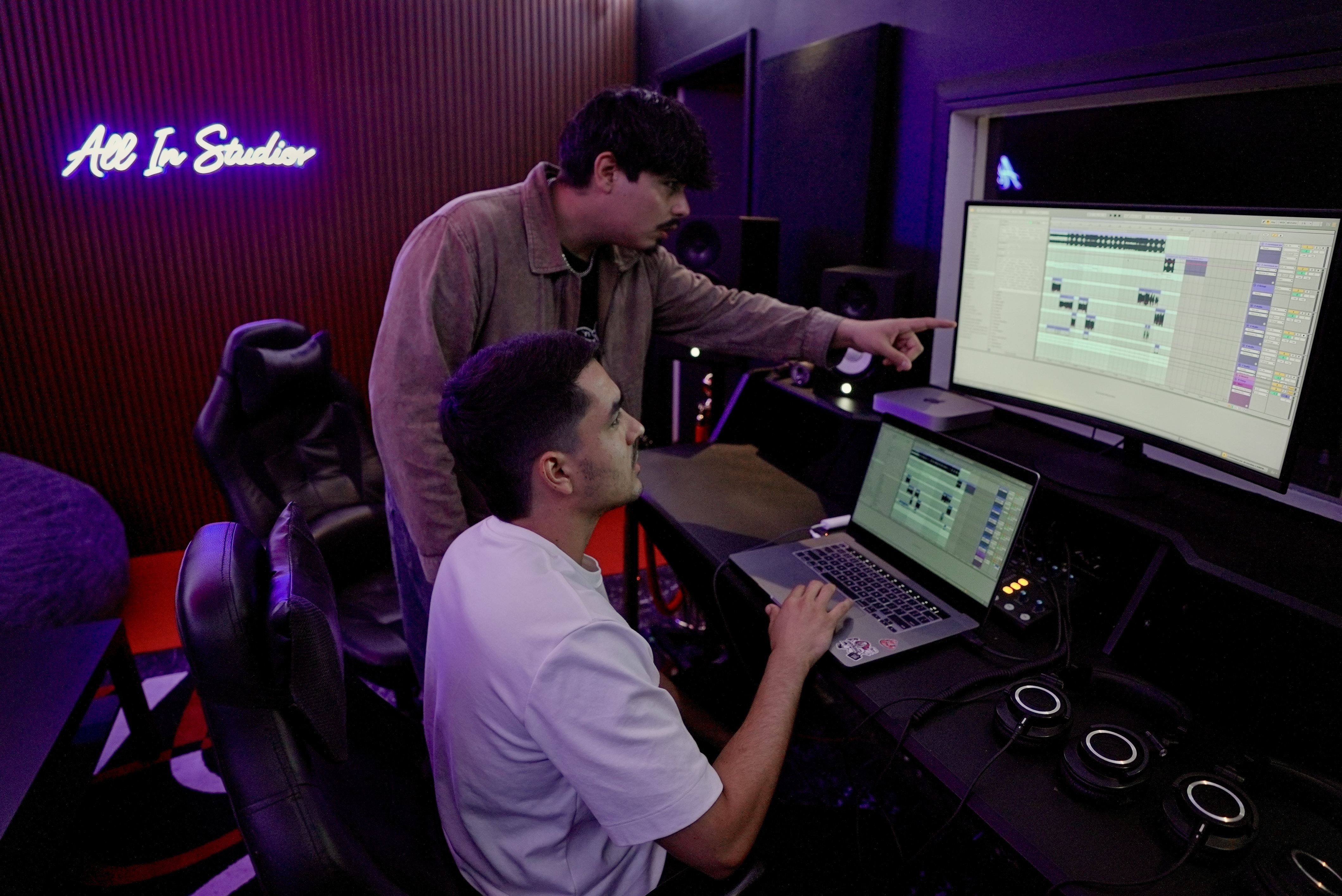 Engineer and artist in a recording session