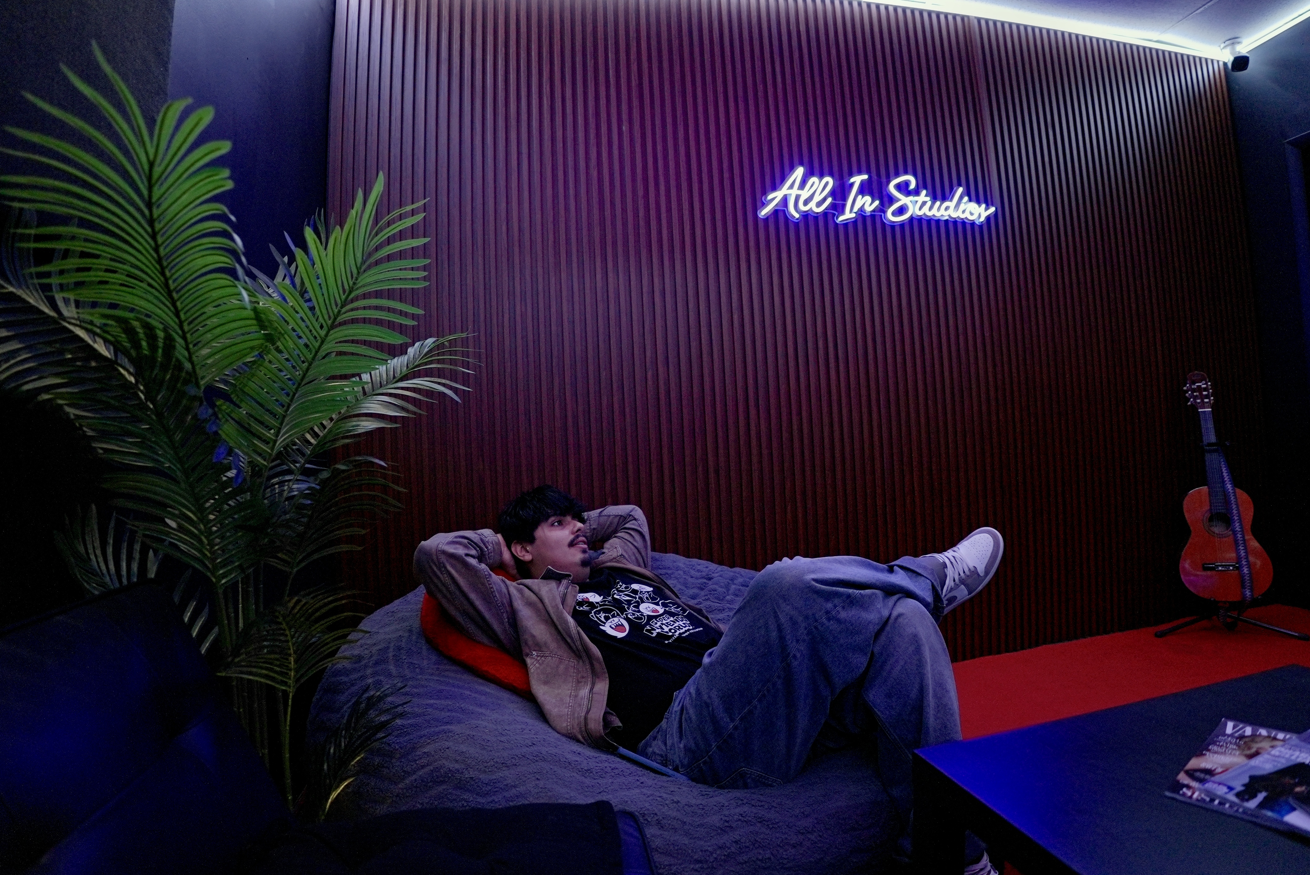 Artist lounge with All In Studios sign